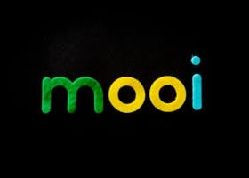 pexels-photo-1337380-1337380 Vibrant and modern typography spells 'mooi' in green, yellow, and blue on black.